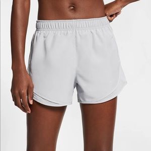 Nike Dry Fit running shorts in white/light grey.